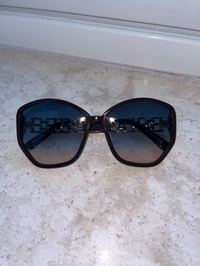 Bally Oversized Dark Sunglasses by Bally — pre-loved on Thrifted.mt
