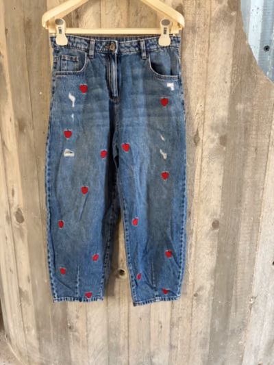 NextGirls blue heart jeans by Next — pre-loved on Thrifted.mt