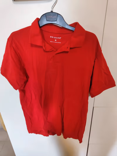 Red polo shirt — pre-loved on Thrifted.mt