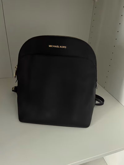 Michael Kors black backpack by Michael Kors — pre-loved on Thrifted.mt
