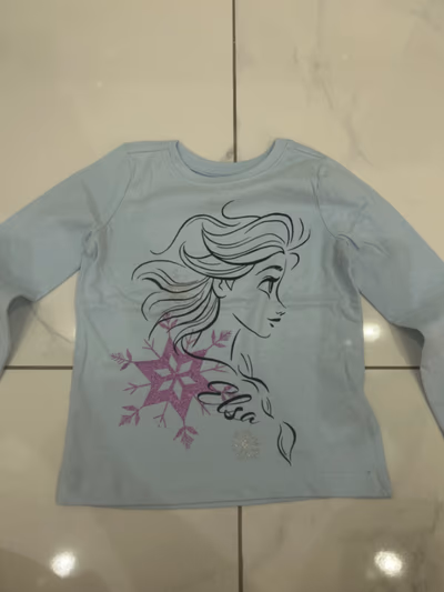 Frozen Elsa light blue top — pre-loved on Thrifted.mt