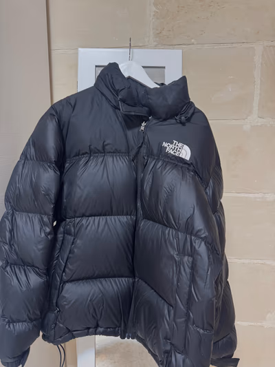 The North Face puffer jacket by The North Face — pre-loved on Thrifted.mt